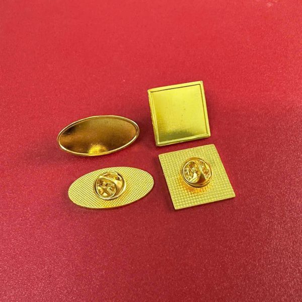 HUY HIỆU CÀI ÁO ĐỒNG MẠ MÀU VÀNG (HÌNH VUÔNG  & BẦU DỤC)